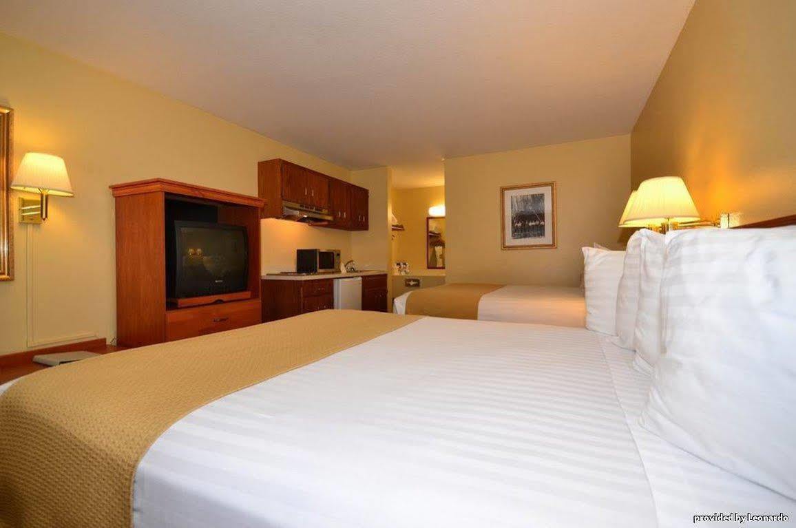 Oakridge Inn & Suites Rom bilde