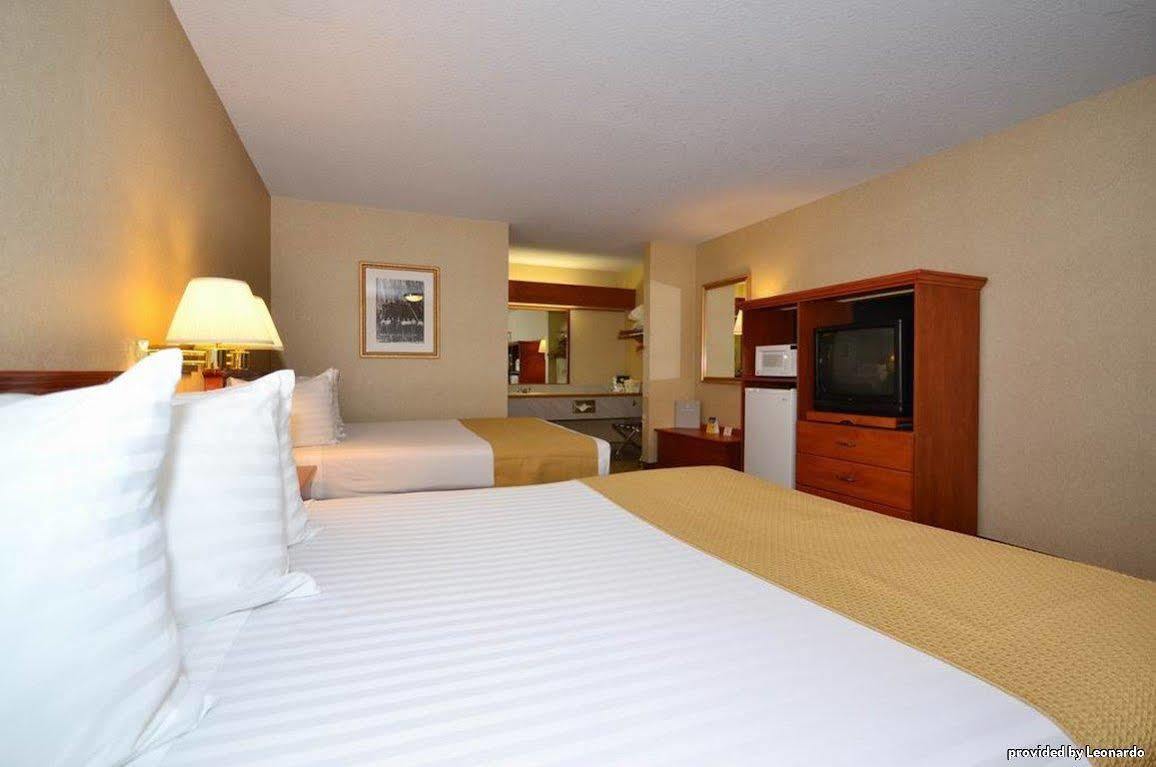 Oakridge Inn & Suites Rom bilde