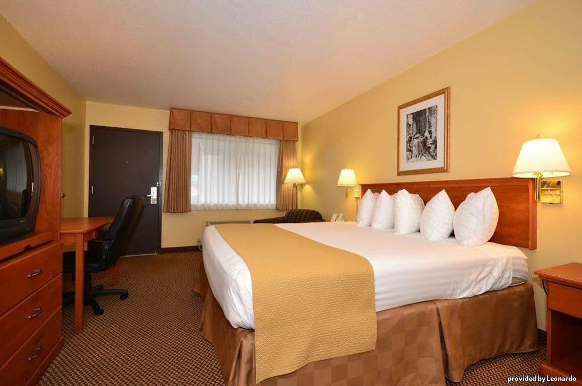 Oakridge Inn & Suites Rom bilde